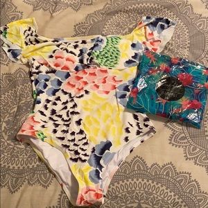 Off shoulder one piece.